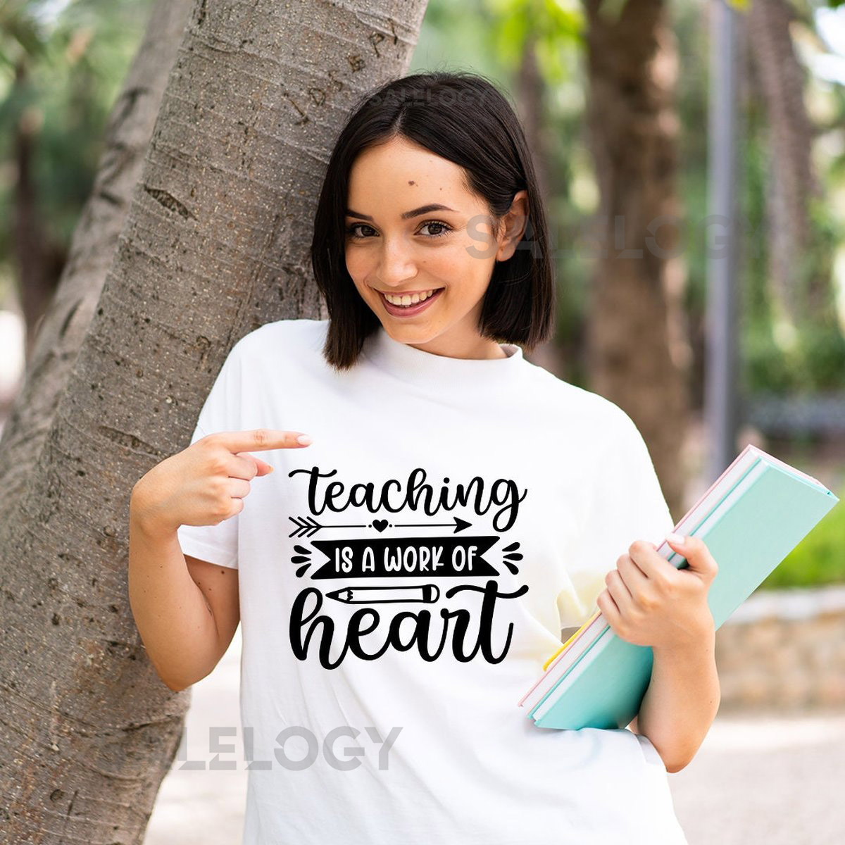 Teaching Is a Work of Heart T-Shirt - Customized Graphic Unisex Tee - Gift For Teacher's Day - Teacher Appreciation Tee -Passionate Educator_1019