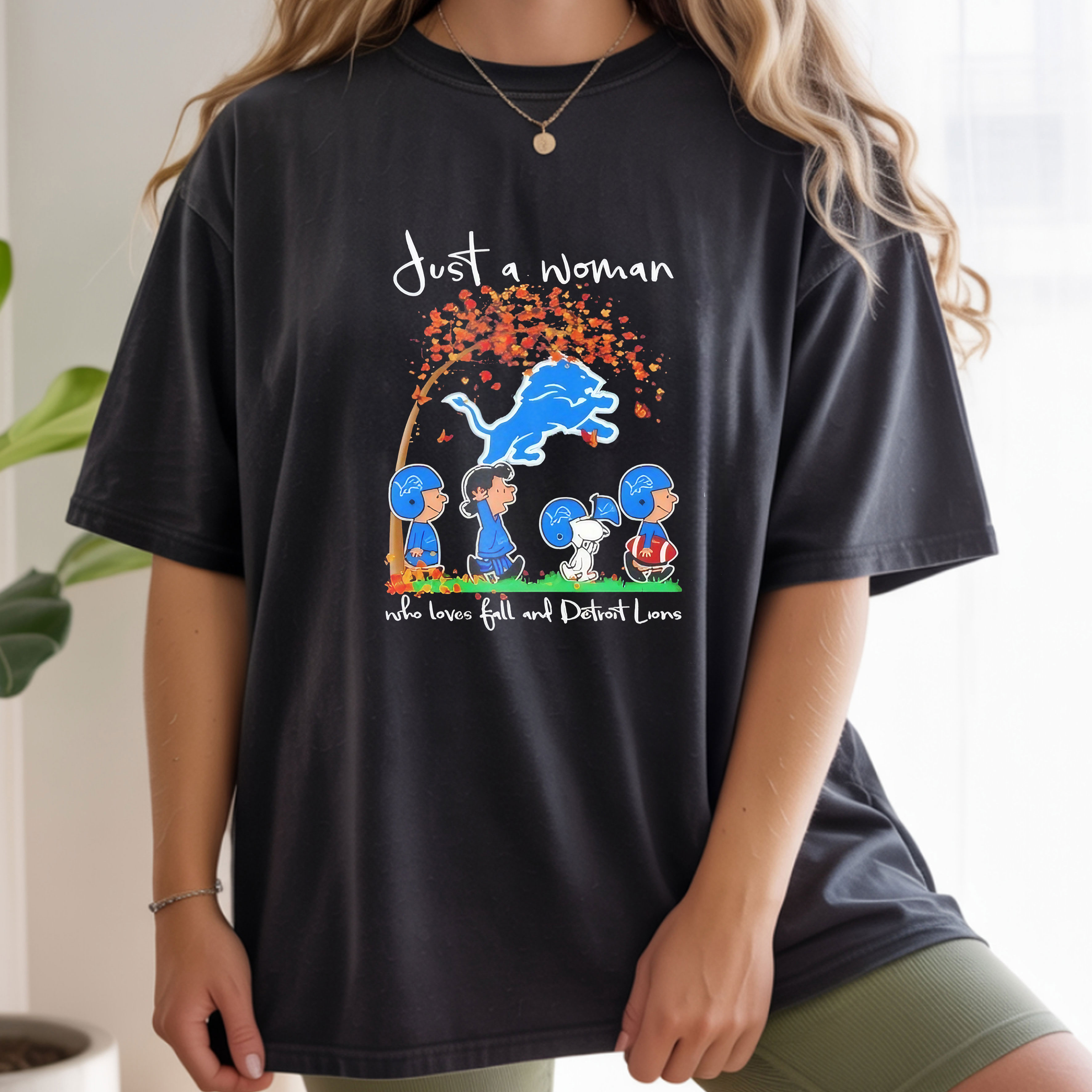 Peanuts Just a Woman Who Loves Fall and Detroit Lions Team Happy Fall NFL Football Autumn Vintage Bootleg Seasonal Apparel – T-Shirt, Hoodie & Sweatshirt